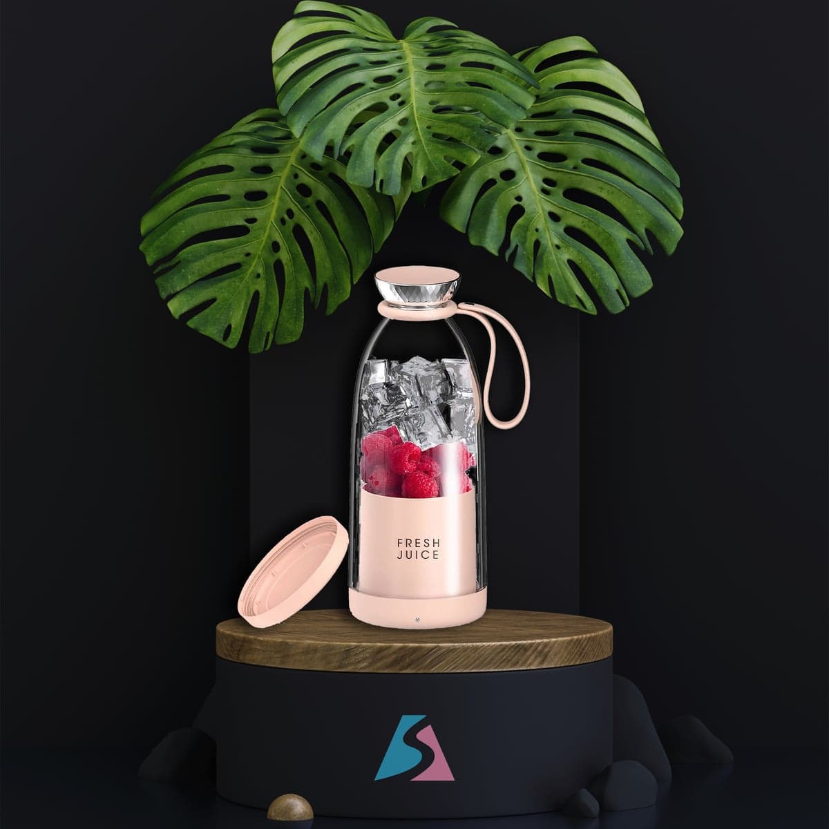 Pink Fresh Juice portable blender with raspberries and ice